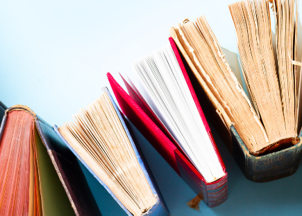 books arranged on a curve