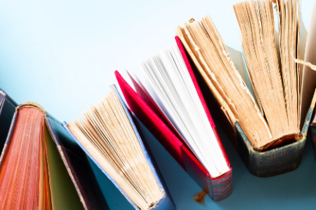 books arranged on a curve