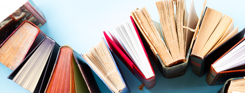 books arranged on a curve