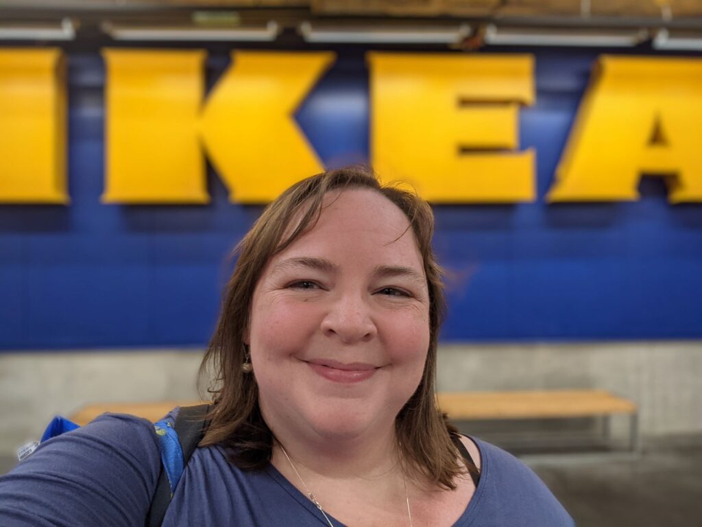 Liz smiles outside the KC IKEA