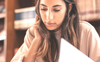 A woman at a library doing research